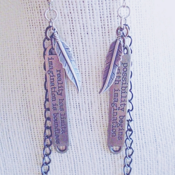 Jewelry - Words of Wisdom dangling earrings.